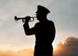 A silhouette of a person playing a trumpet

Description automatically generated